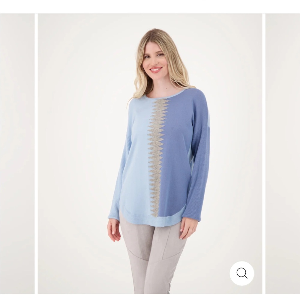 Gaby Isabella size S ( roomy can also fit a M). Blue soft knit sweater
